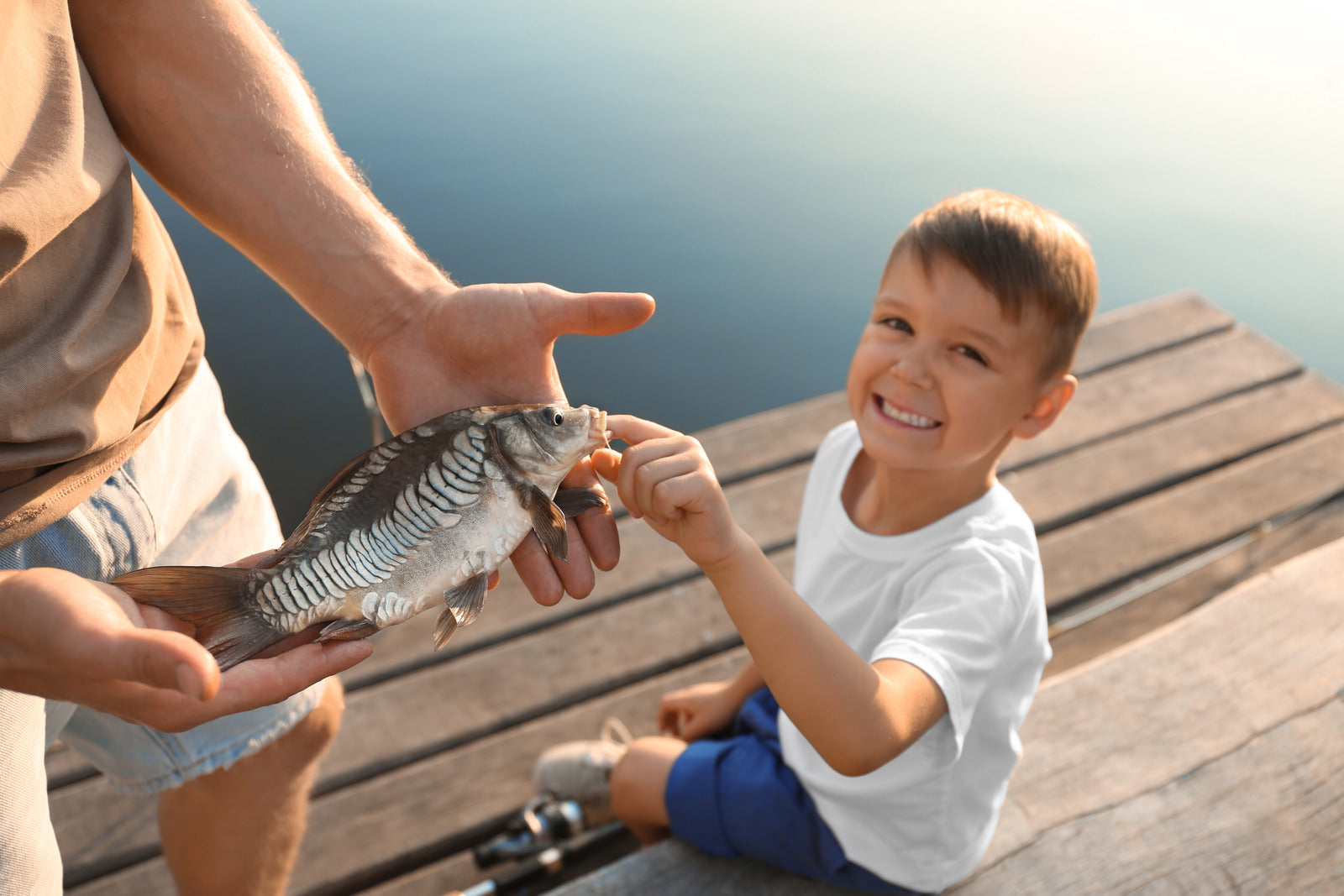 A father and son have fun fishing and making memories.